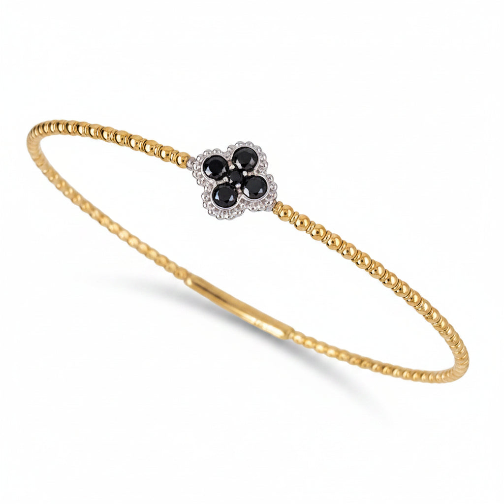 Kent Island Jewelry 14K YG Flex Bangle with black diamonds (0.41ctw), four-petal flower design.