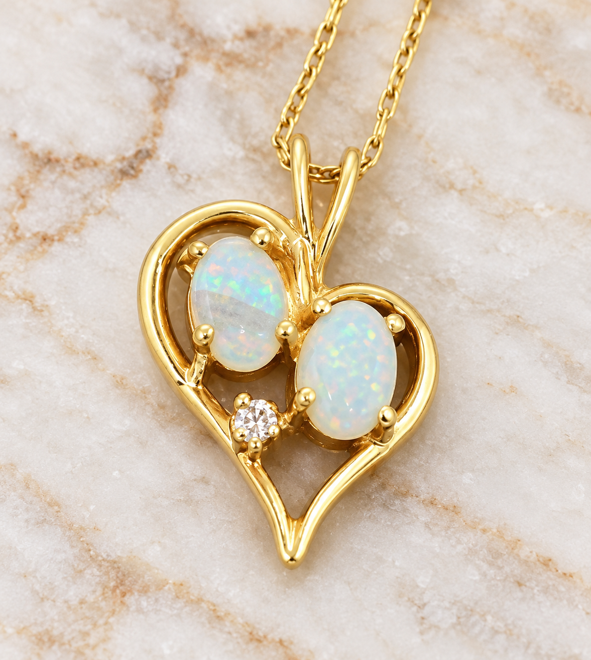 Estate 14k Yellow Gold Diamond & Fire Opal Gemstone Heart/Love Chain Necklace with two oval opals and a small diamond.
