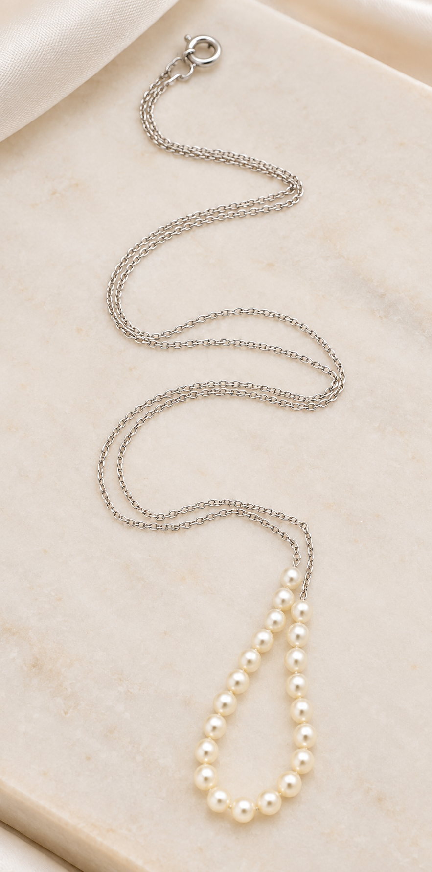 Estate 14k White Gold Pearl Cable Chain Necklace featuring a delicate chain with a teardrop-shaped section of pearls.