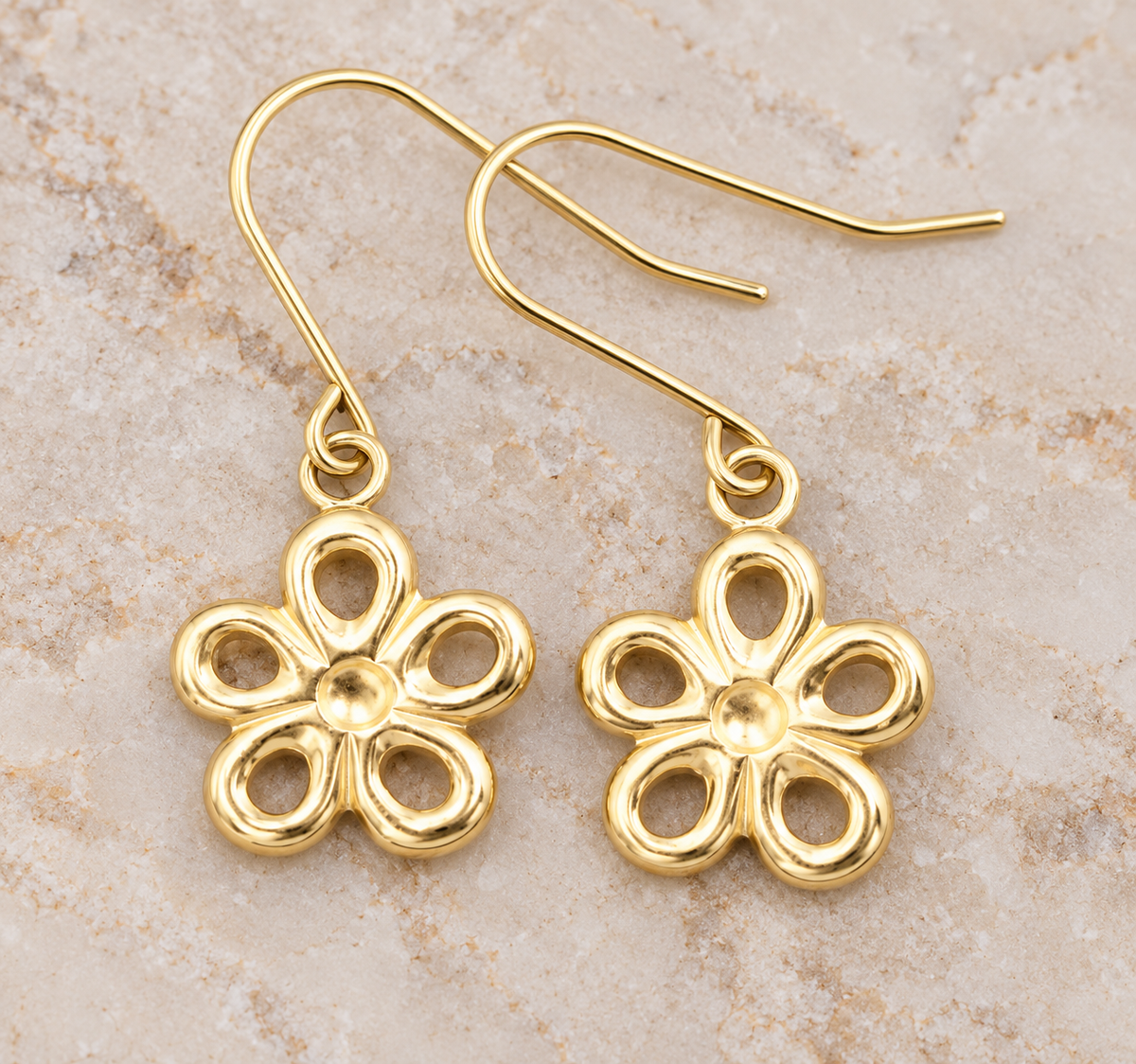 Kent Island Jewelry 14k yellow gold open work flower dangle earrings with an open-work design and curved ear wires.
