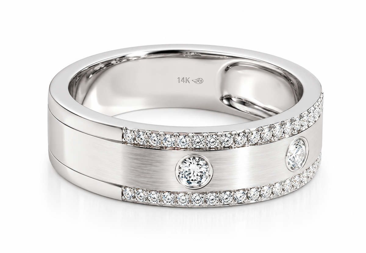 A white gold band ring with a brushed center channel, rows of small pavé diamonds, and three round-cut diamonds, shown on a white background.
