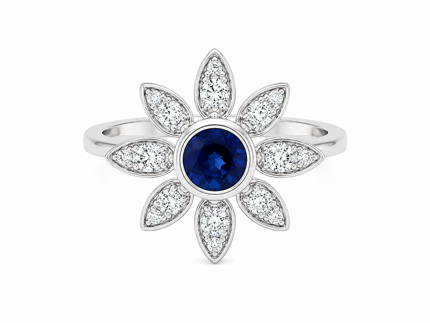 A white gold flower-shaped ring featuring a round deep blue sapphire center stone and eight surrounding marquise-cut and round clear stones, shown on a plain white background.