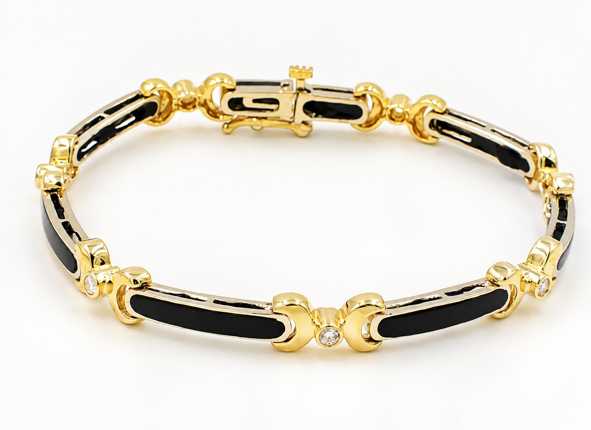 Kent Island Jewelry 14k yellow gold link bracelet with alternating black onyx bars and small round diamonds.