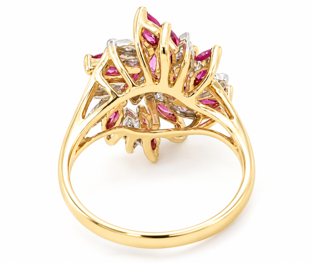 Estate 10k YG ruby & diamond cocktail ring by Kent Island Jewelry, floral cluster with leaf-like prong details.
