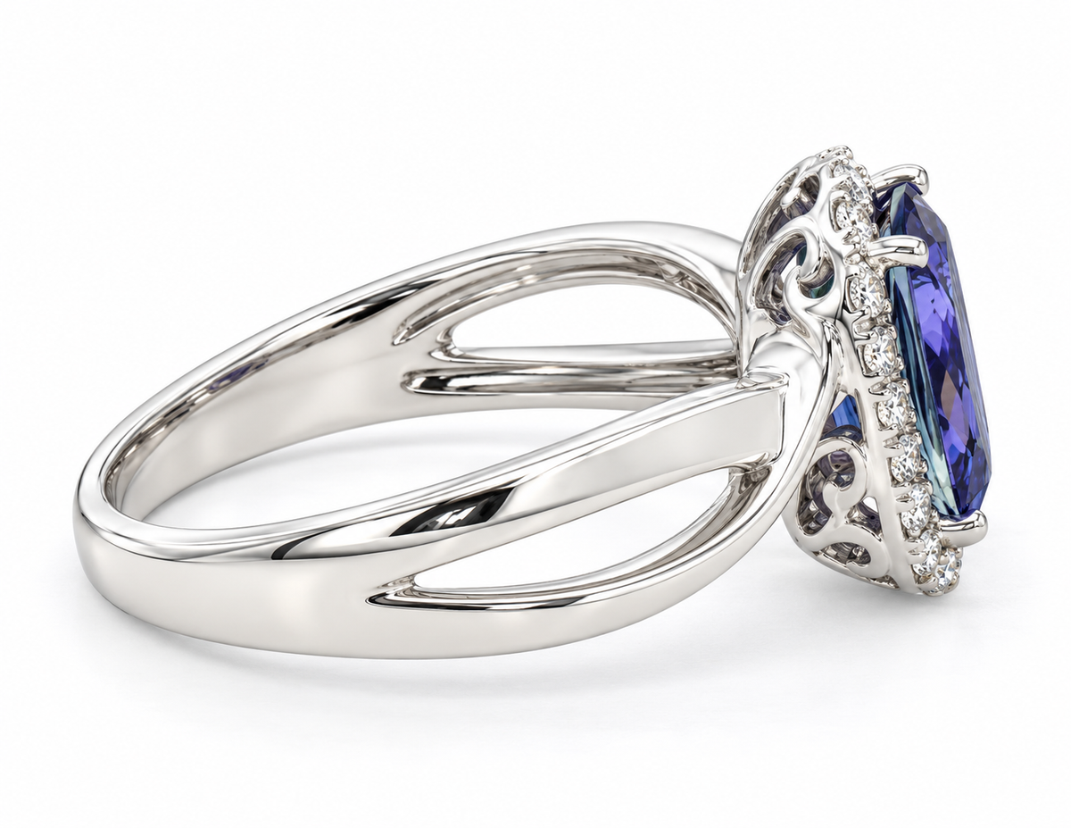 A white gold ring featuring a large oval-cut blue tanzanite center stone surrounded by small pavé-set clear stones, shown on a clean white background.