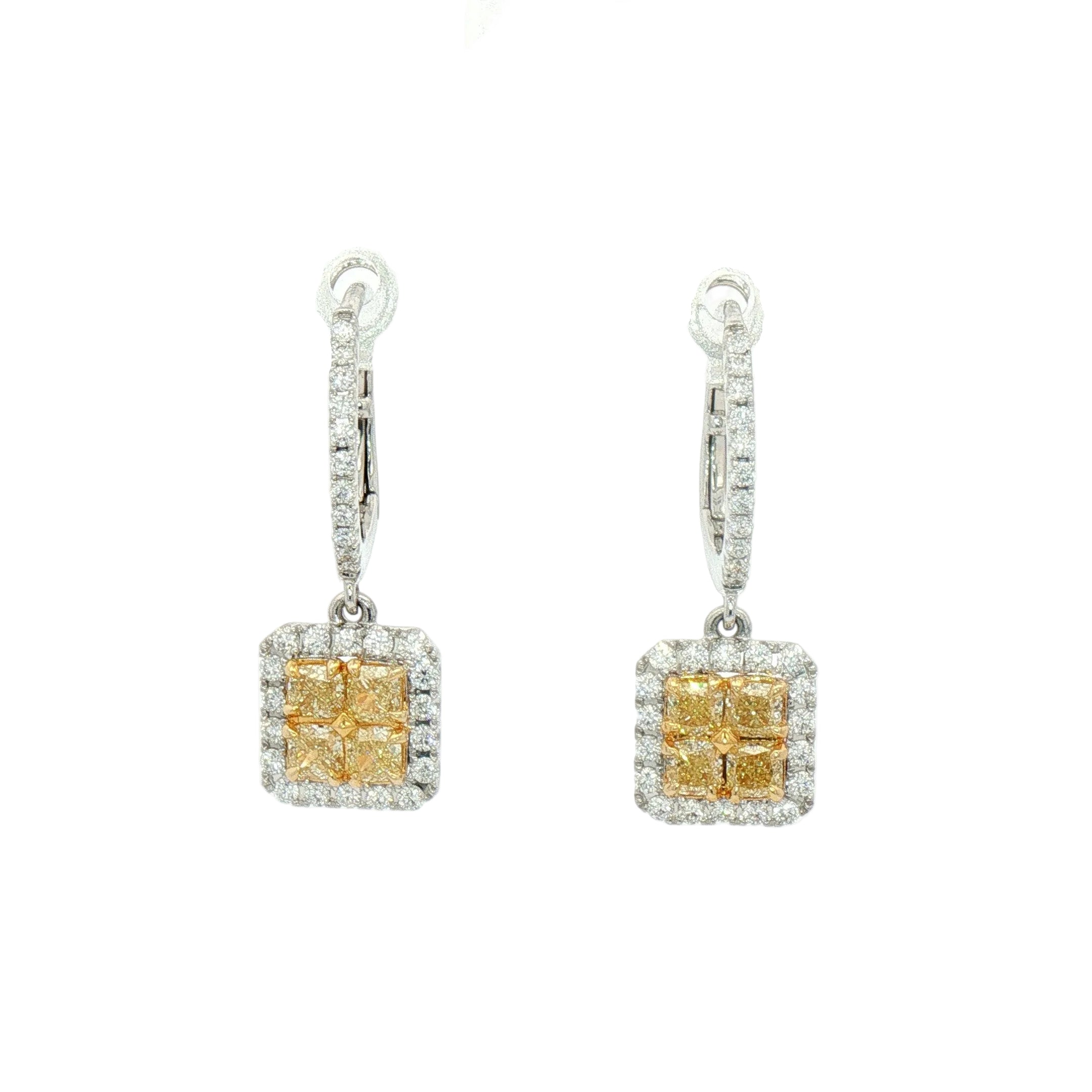 A pair of square drop earrings with yellow gemstones in a halo setting, suspended from silver-toned leverback hooks with small clear stones, displayed on a clear plastic hanger against a white background.