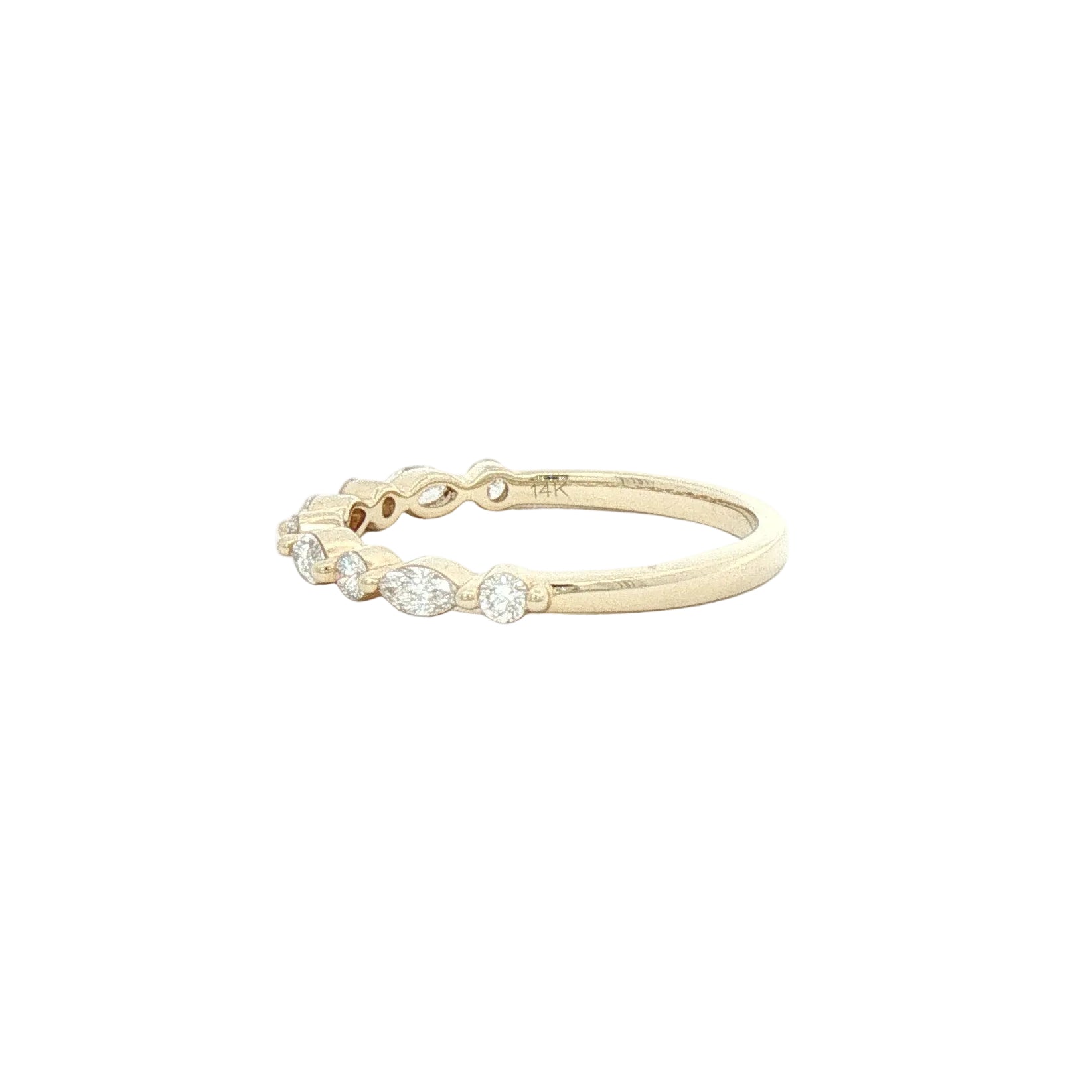 A yellow gold diamond band ring featuring a row of marquise and round-cut lab-grown diamonds set in a continuous row.