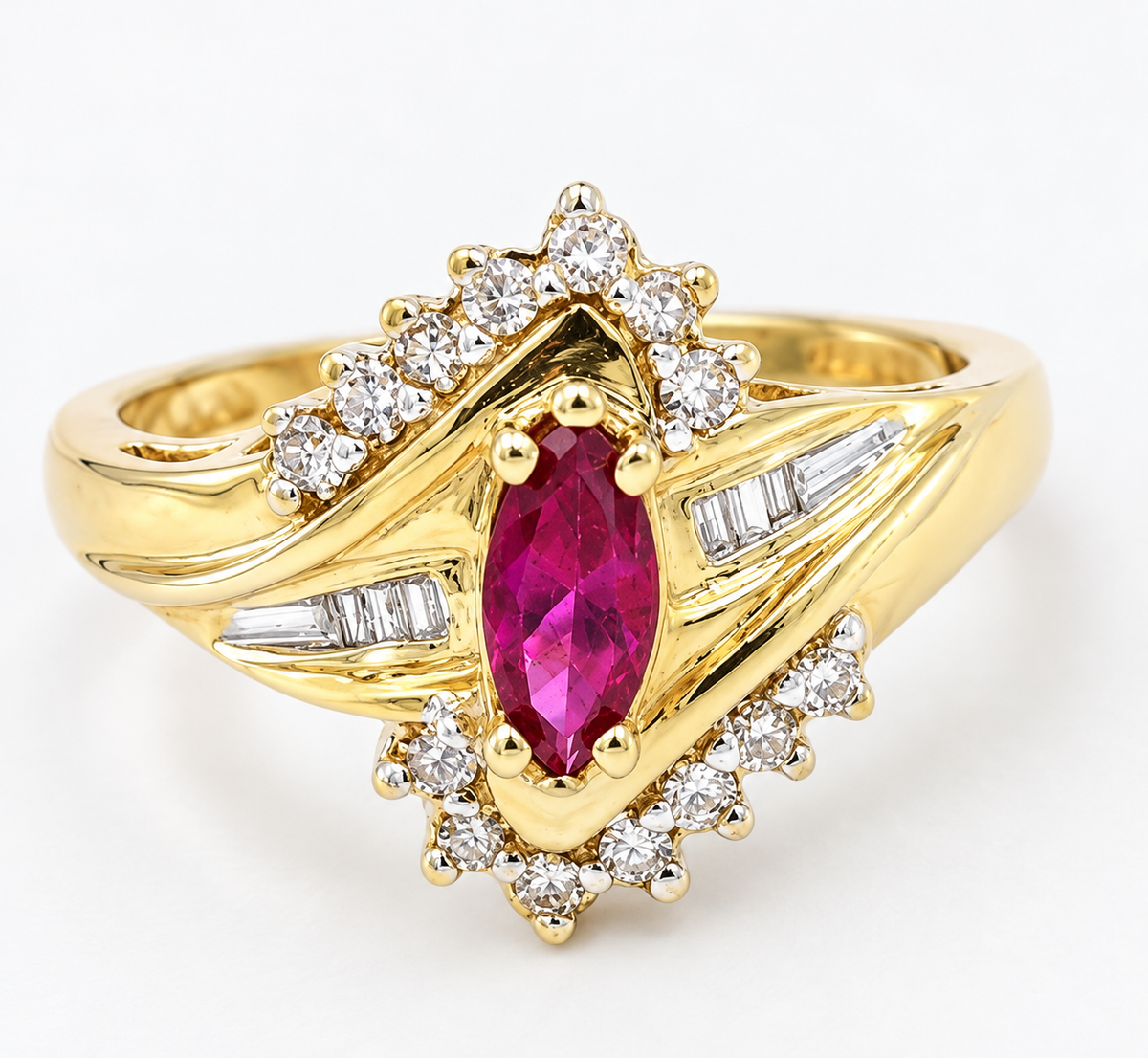 Kent Island Jewelry Estate 10k Yellow Gold Diamond & Ruby Gemstone Ring with a marquise-cut ruby and diamond accents.