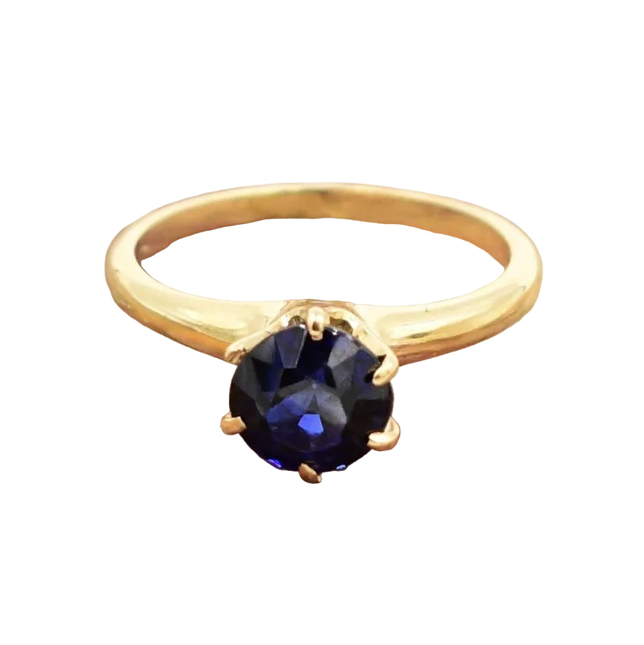 Kent Island Jewelry Estate 14k YG Blue Sapphire Solitaire Ring on white background.
