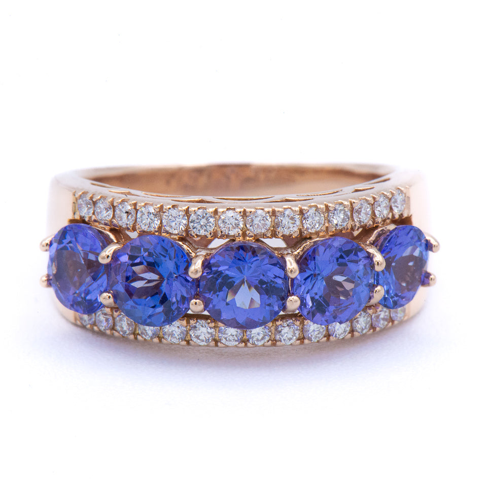 Kent Island Jewelry Estate 14K Tanzanite & Diamond Ring; five stones, diamond side rows, resizable for custom fit.