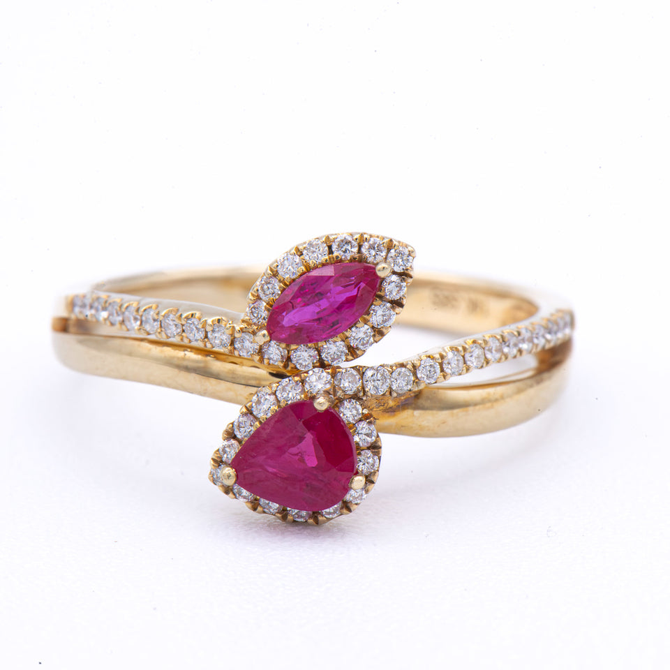 Kent Island Jewelry 14K Yellow Gold bypass ring with pear & marquise rubies and dazzling diamonds.