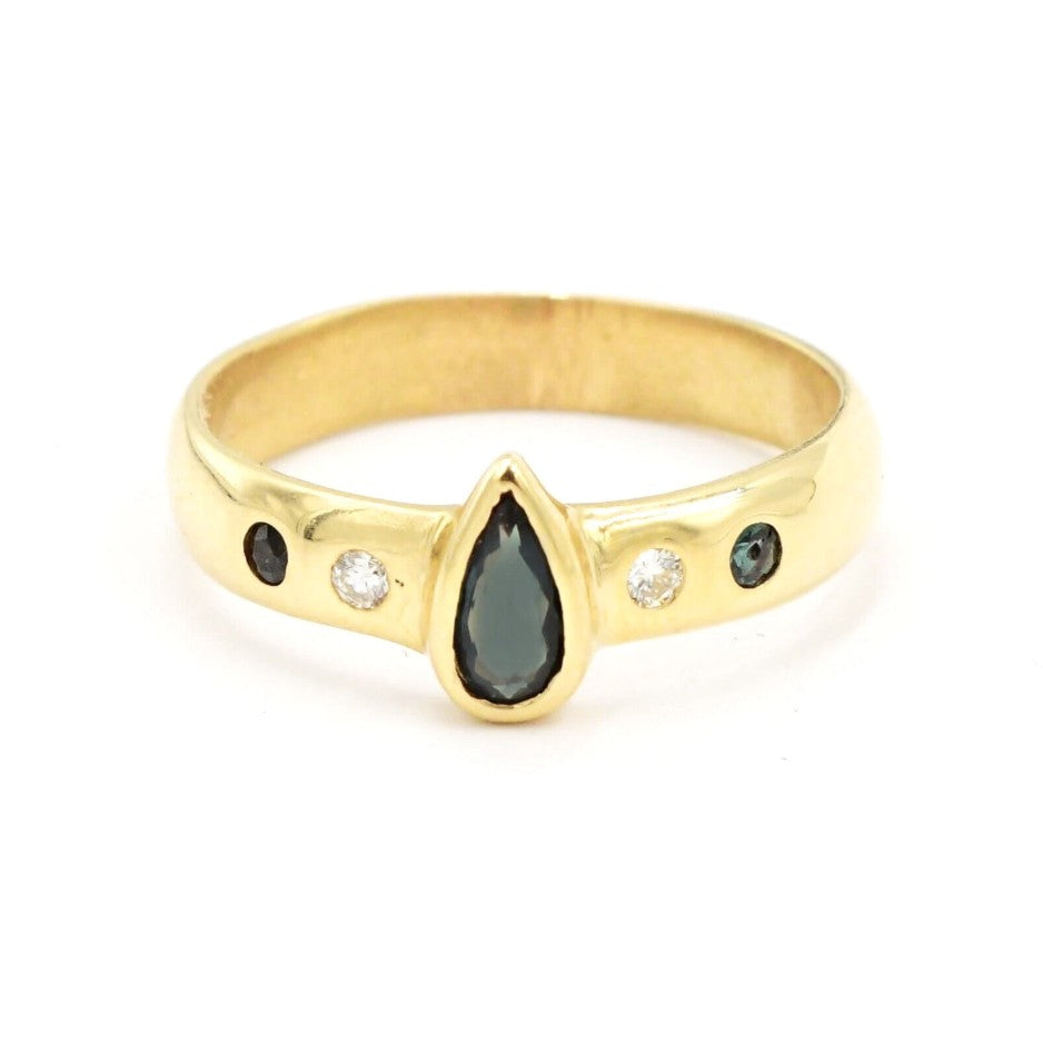 Estate 18k yellow gold ring with sapphire and .05ctw diamonds by Kent Island Jewelry.
