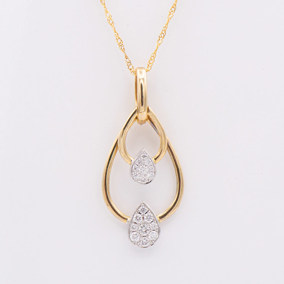 Kent Island Jewelry 14k. Diamond Double Tear Drop Necklace features a sparkling pendant on a delicate gold chain.