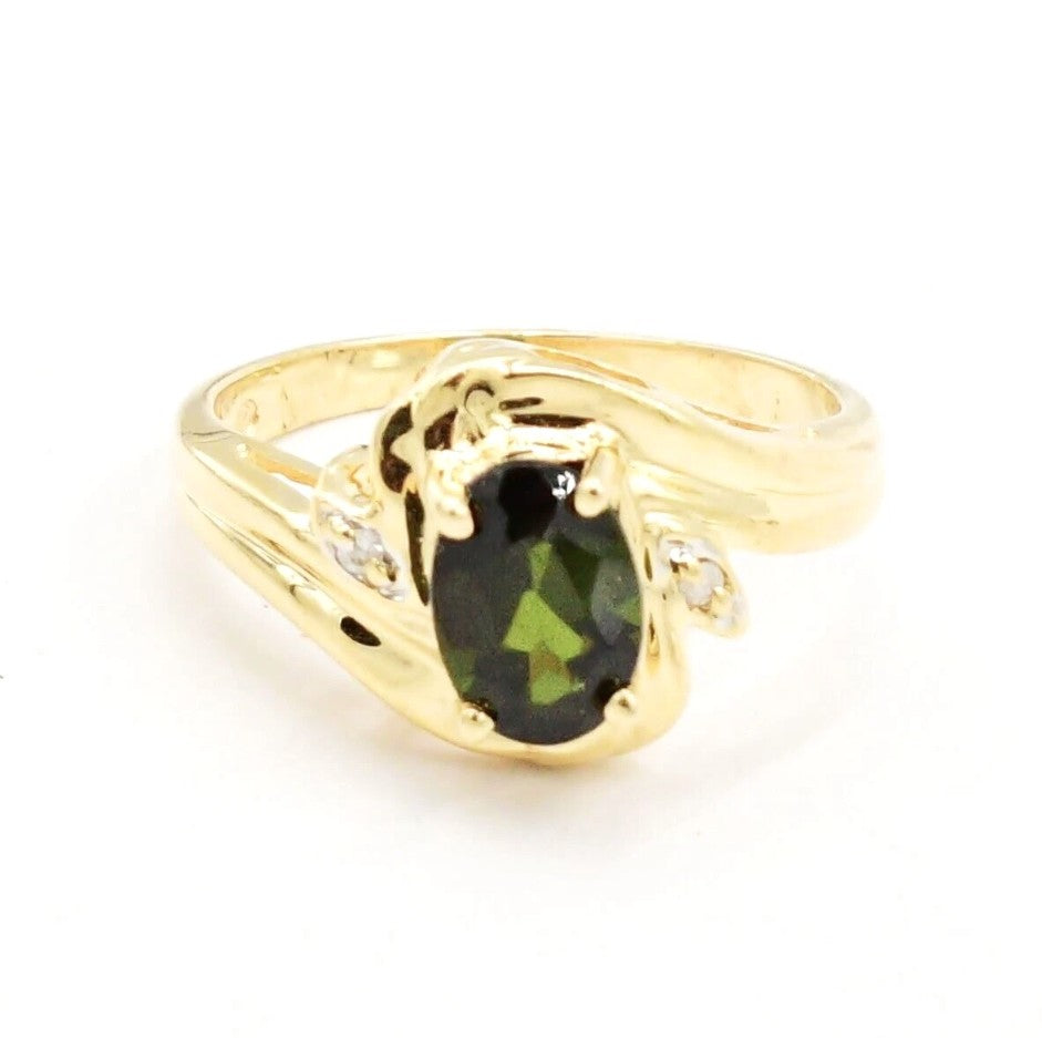 Kent Island Jewelry Estate 14k YG ring with emerald & diamond accents (.01 tcw) in a swirling design.