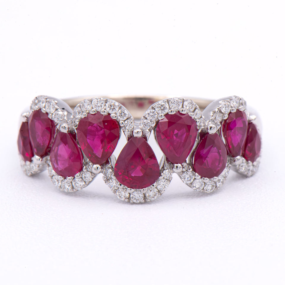 Kent Island Jewelry 14K white gold band features pear-shaped rubies and diamonds in a striking statement ring.