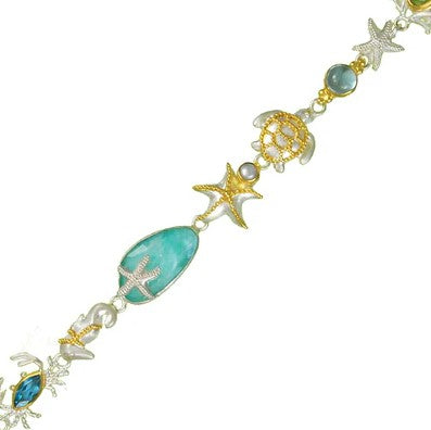Michou's Sterling 0.925 & 22kt Vermail B Bracelet features sea motifs, blue stones, and silver-gold accents.