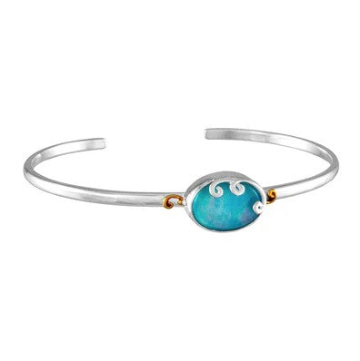The Michou M. Portals Cuff features an oval Amazonite centerpiece and elegant silver wave designs.