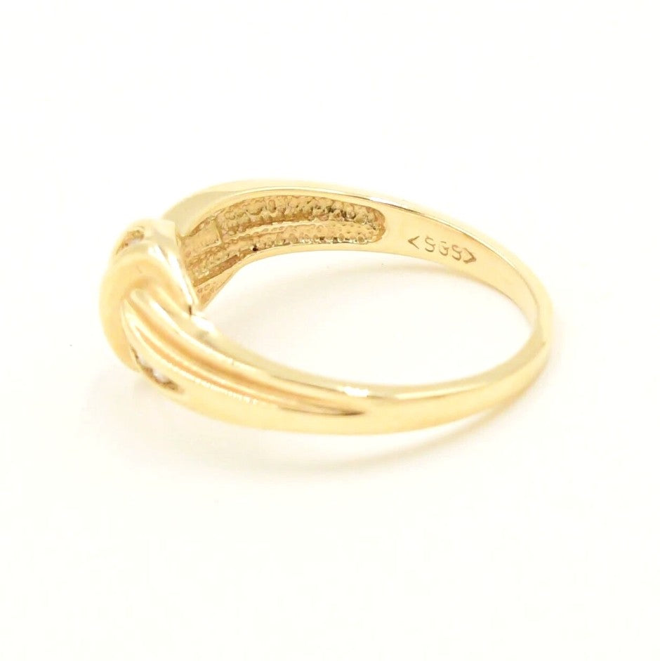 Kent Island Jewelry Estate 14k yellow gold X crossover band ring with .16tcw diamonds and hallmark stamped inside.