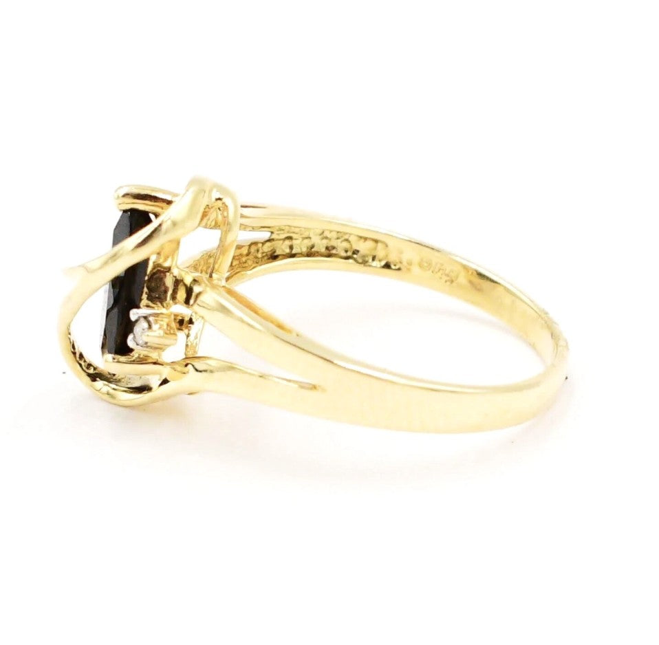 Kent Island Jewelry Estate 14k YG ring with onyx, diamond accents (.02 tcw), and a swirl design.