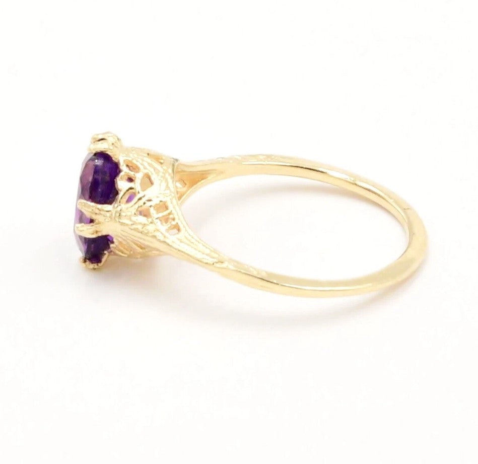 Kent Island Jewelry Estate 14k YG Amethyst Open Work Textured Ring shown on white background.