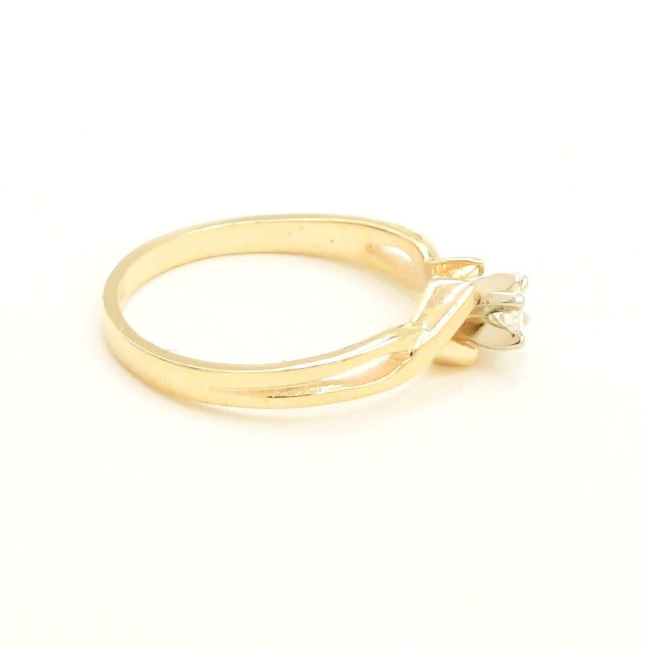 Kent Island Jewelry Estate 14k YG open work diamond (.01 tcw) solitaire ring, size 6, on white background.