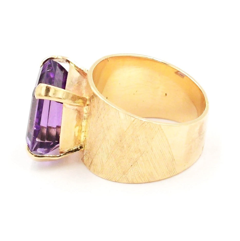 Kent Island Jewelry's Estate 14k YG Amethyst Textured Band Ring features a wide band and large rectangular gemstone.