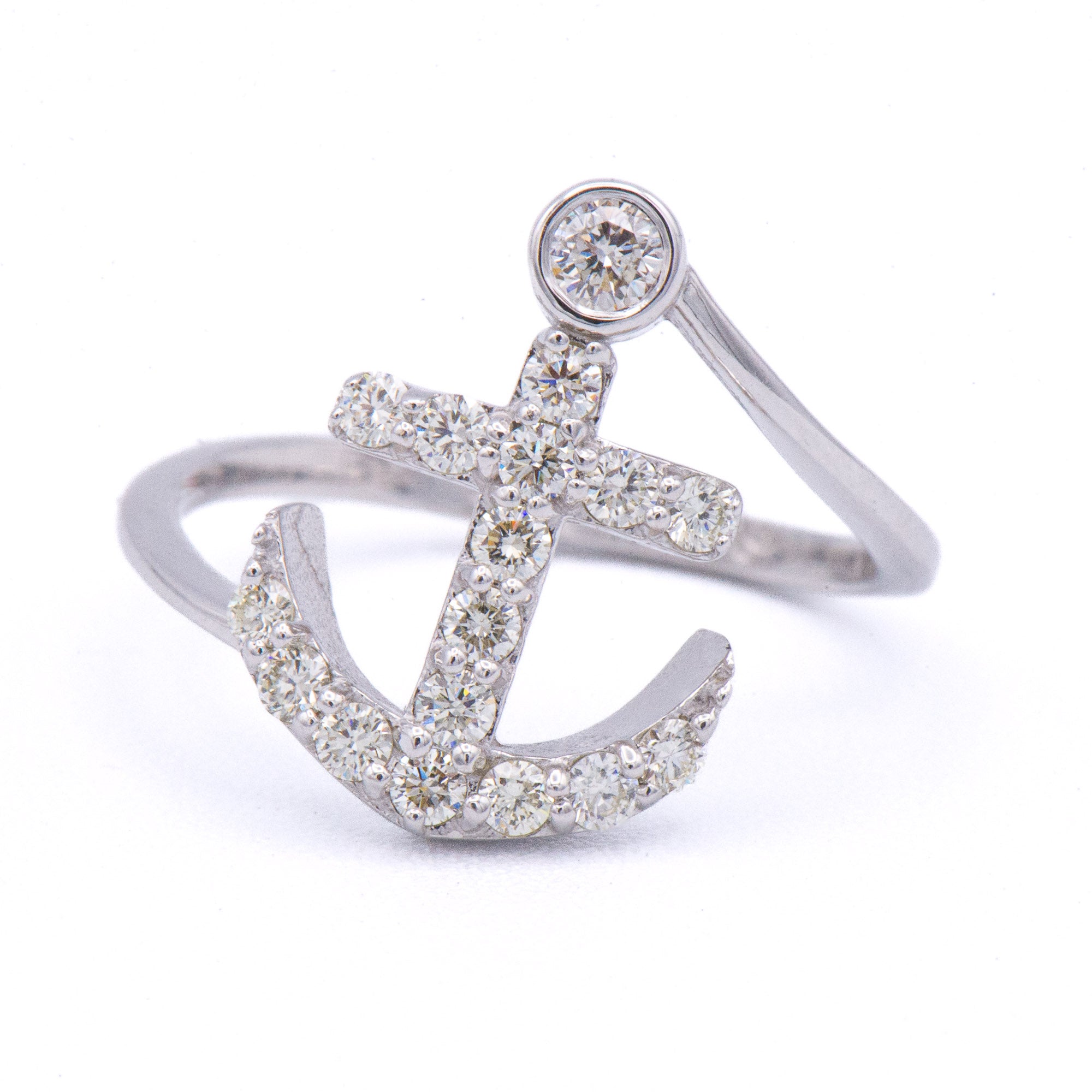 Heera Moti 14k 1/2 Carat Diamond Anchor Ring with a nautical design on a gleaming white backdrop.