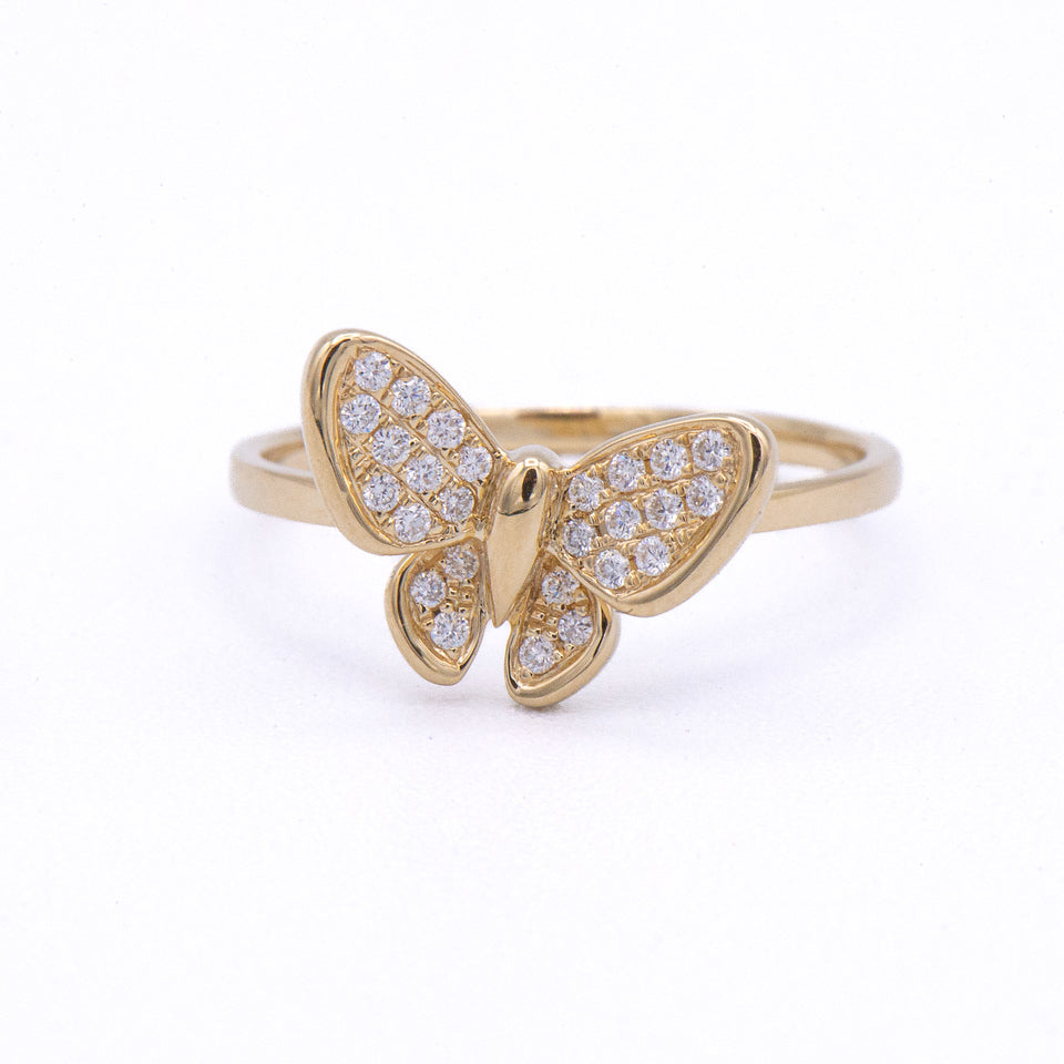 Kent Island Jewelry’s 14k Diamond Butterfly Ring features sparkling stones and a sleek band—an elegant, custom piece.