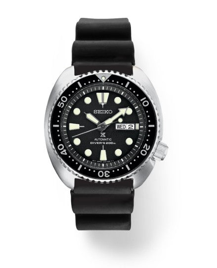 Seiko Prospex Diver SS Automatic with black dial, black strap, and date display set to Wednesday, 21.