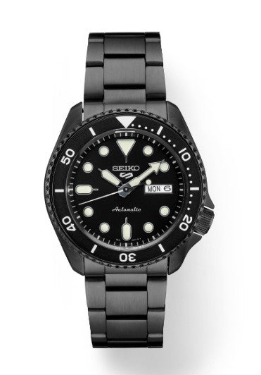 Seiko 5 Sports SS Black Ct Automatic with black dial, stainless steel band, and day-date display.