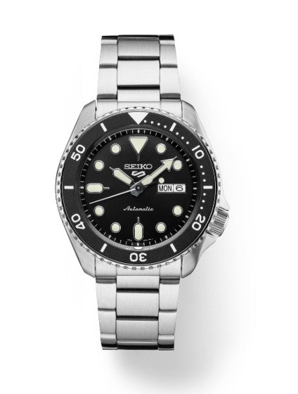 Seiko 5 Sports SS Automatic watch with black dial, silver markers, and stainless steel bracelet displays day and date.