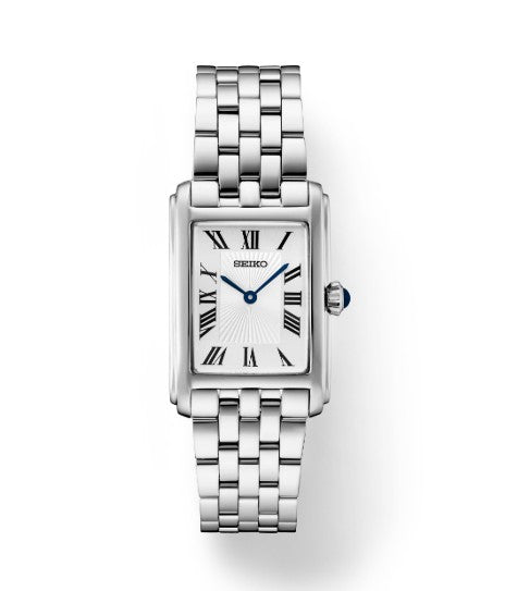 Seiko Essentials SS Quartz white dial watch with rectangular case and stainless steel bracelet.