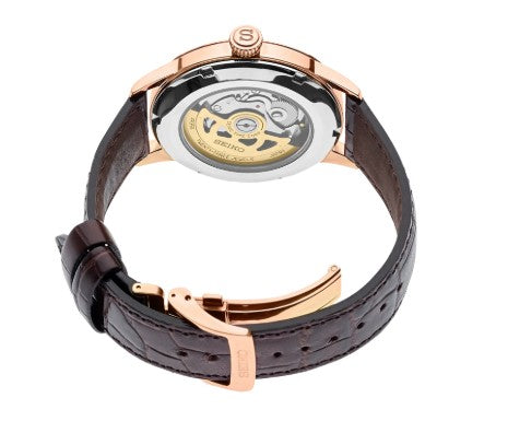 The Seiko Presage Cocktail Time Automatic features a burgundy dial and a transparent case back.