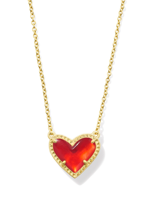 Kendra Scott ARI HEART Pendant Necklace in Gold features a red illusion heart and asymmetrical gold-bordered design.
