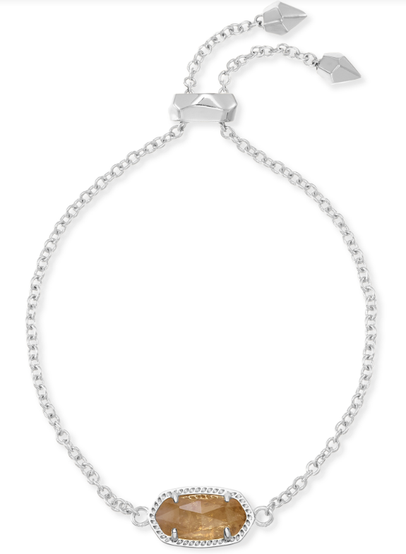 Kendra Scott Elaina bracelet in rhodium with an adjustable chain and orange citrine quartz stone—an essential piece.