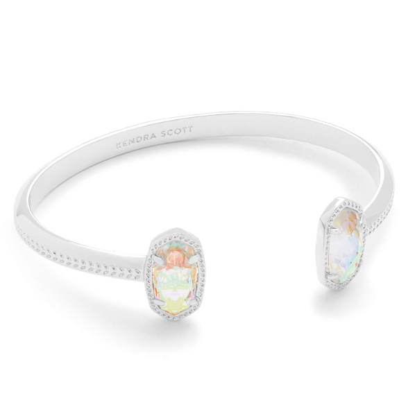 Kendra Scott ELTON Cuff Bracelet: Rhodium, dichroic glass stones, engraved inside—an elegant stacking staple.