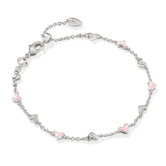 The Kendra Scott HAVEN Delicate Chain Bracelet features pink enamel and silver heart charms on a slim silver chain.