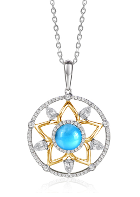 The Alamea SS Larimar Pendant features gold & silver starburst, blue larimar center, and CZ teardrop accents.