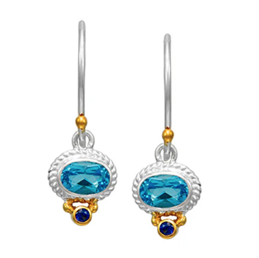 Michou Sterling Silver & 22K Gold Vermeil earrings feature baby blue topaz and a small sapphire stone at the base.