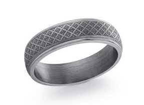 Silver colored laser engraved tantalum ring.