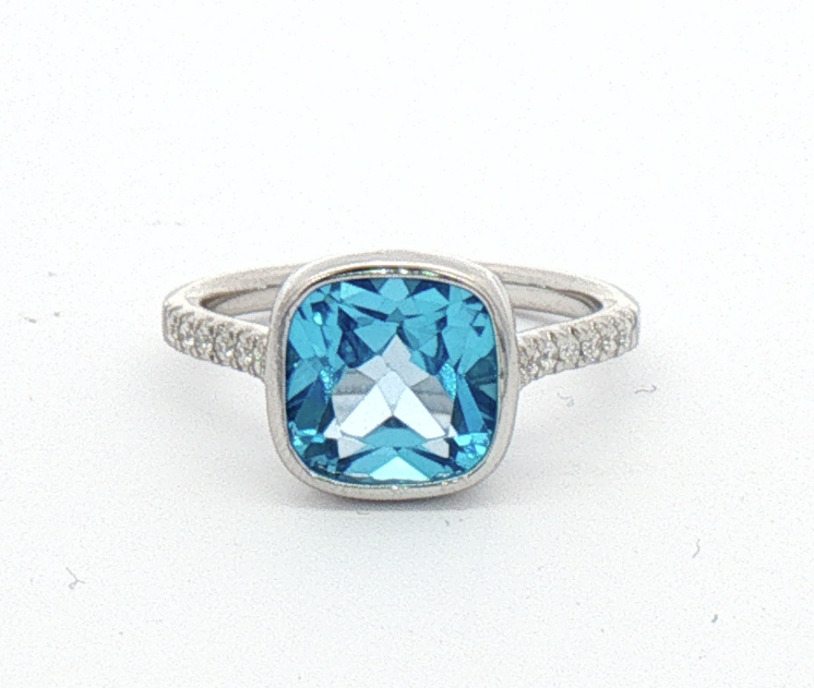 White Gold Blue Topaz and Diamond Ring