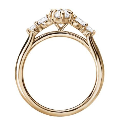 The Romance Classic Semi-Mount Engagement Ring by Romance in 14kt yellow gold, shown in a side view.