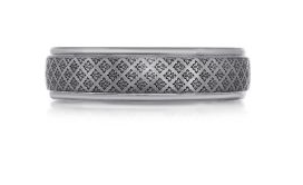 Silver colored laser engraved tantalum ring.