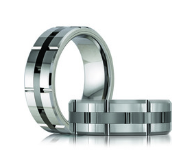 Silver colored tungsten ring with a black stripe.