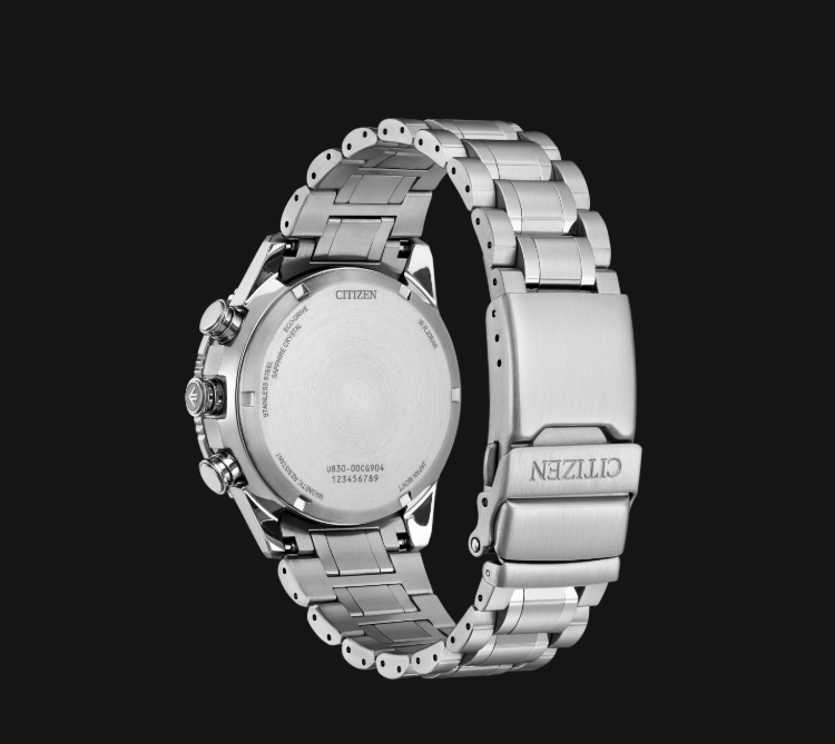 Back of silver Citizens Promaster Skyhawk U830 Watch with clasp, band links, and engraved details visible.