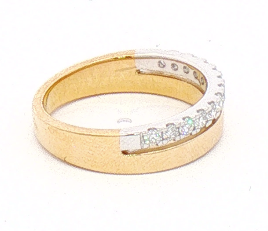A gold band ring featuring a row of small clear gemstones set in a silver-colored channel along the top, shown on a plain white background.