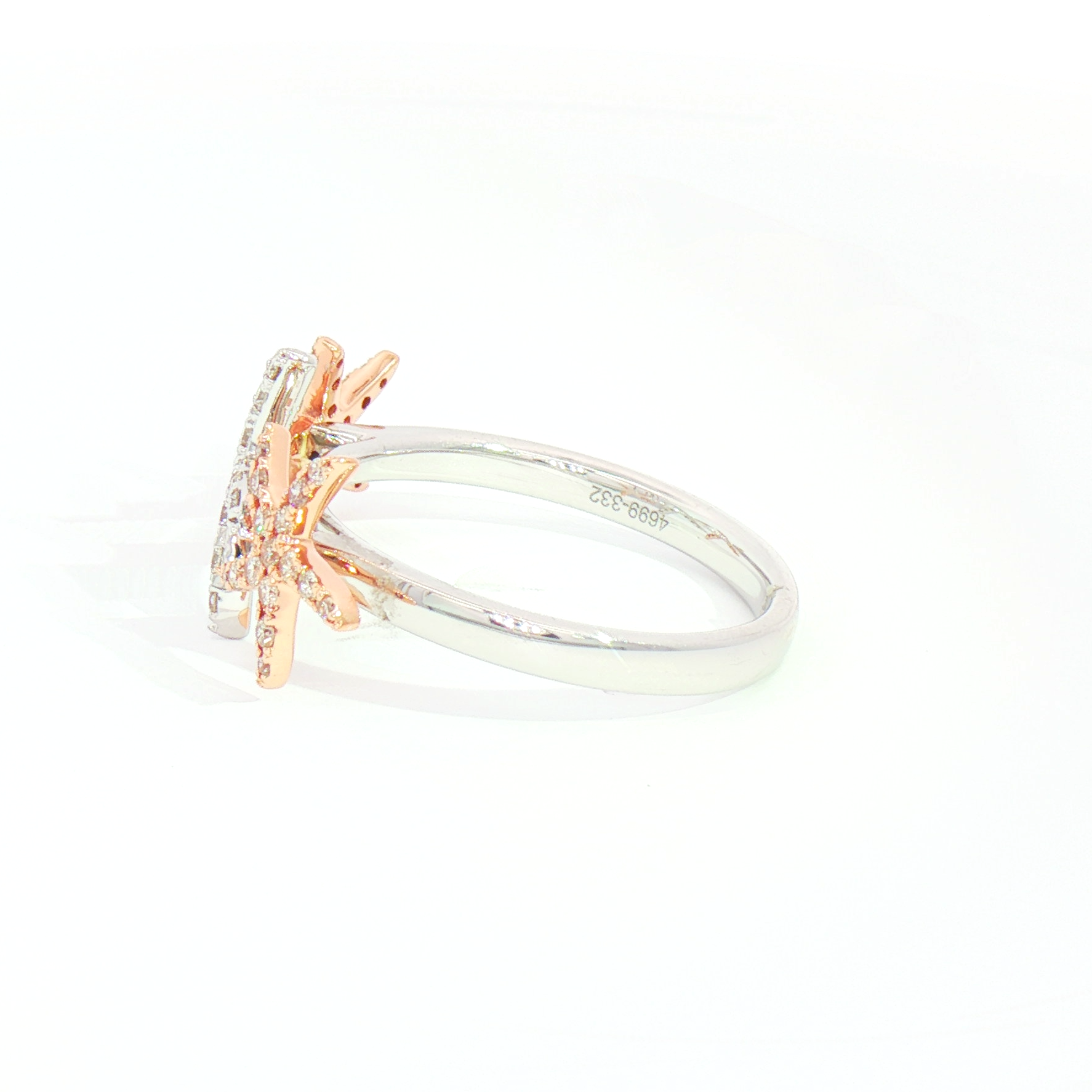 The Kent Island Jewelry 14K 2T Diam Starfish Ring (0.33ctw) has a silver band, rose gold setting, and side diamonds.