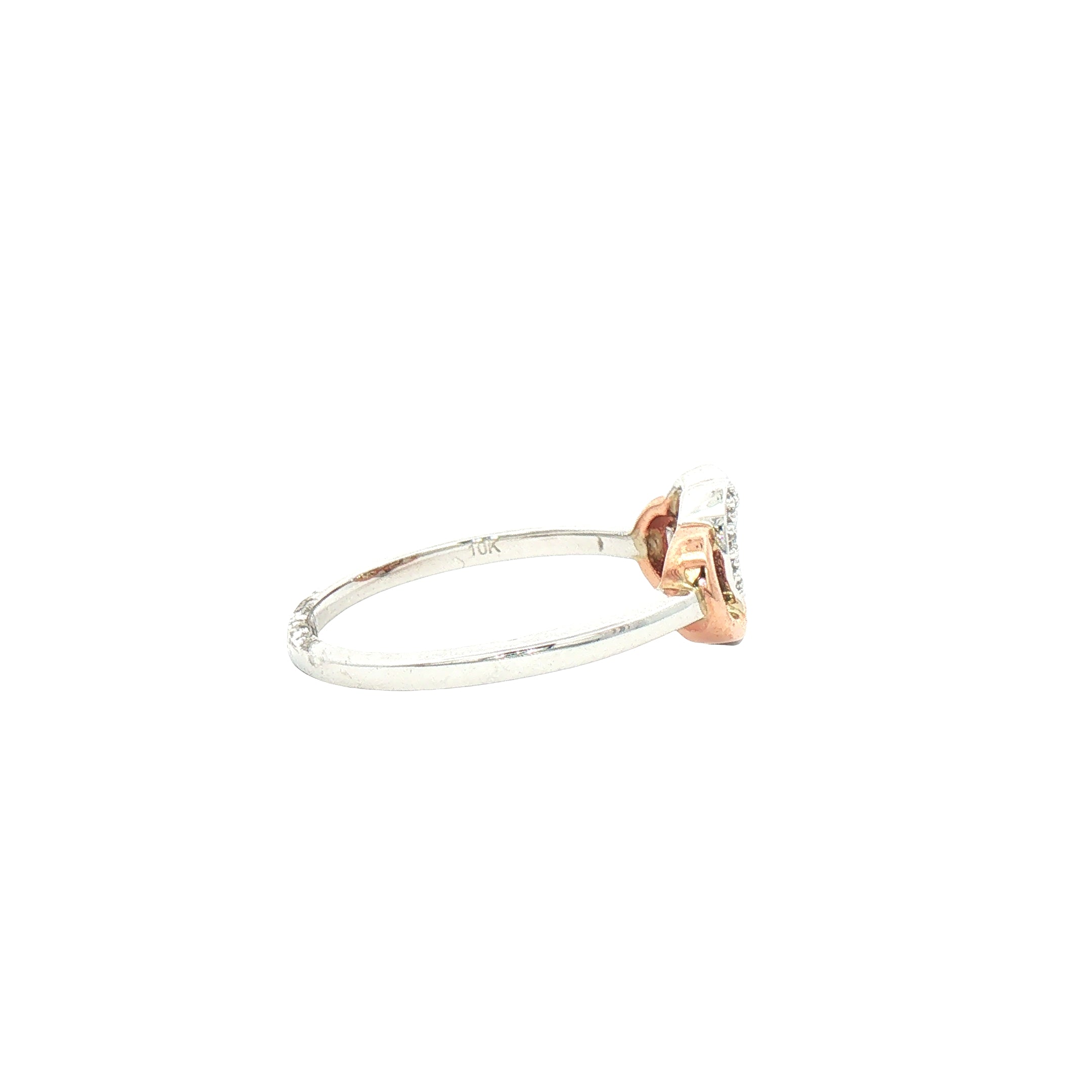 Side view of Kent Island Jewelry's Estate. 10K two-tone gold diamond heart and infinity ring.