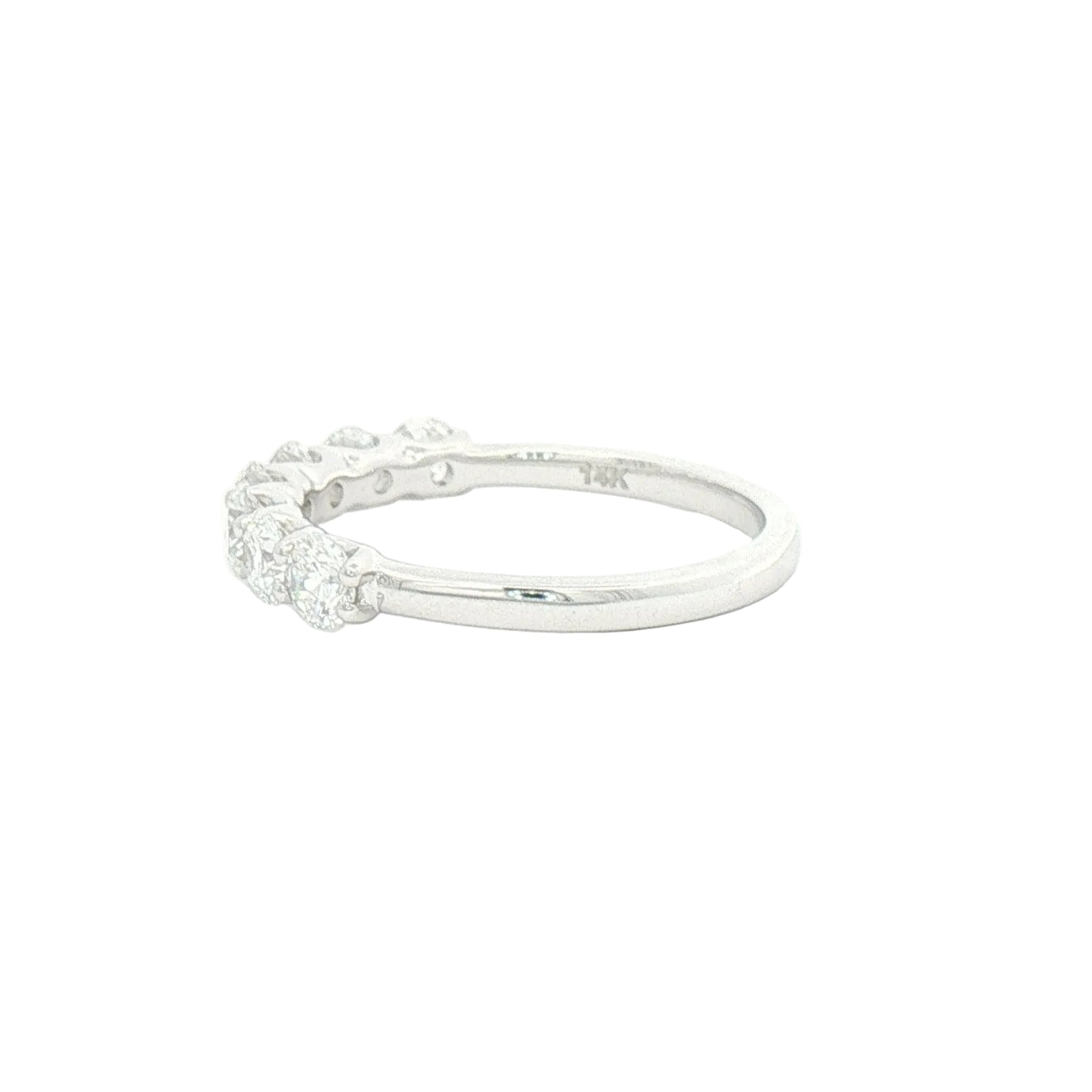 A white gold lab-grown diamond eternity ring with five round-cut diamonds set in a polished white gold band.