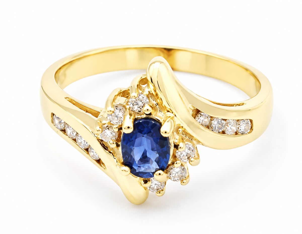 Estate 14k YG Sapphire & Diamond (.13 tcw) Cocktail Ring by Kent Island Jewelry shown on a white background.